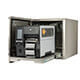 Een open waterbestendige behuizing voor Zebra ZT411 labelprinter met een printer op de uitschuifbare lade van de behuizing